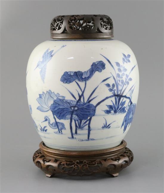 A Chinese blue and white ovoid jar, Kangxi period, H. 20.5cm, excluding wood stand and cover